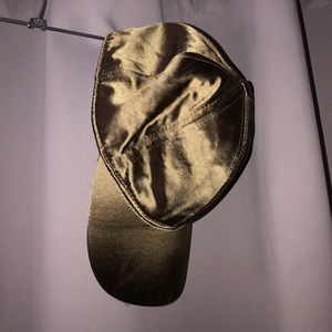 Green metallic H&M hat